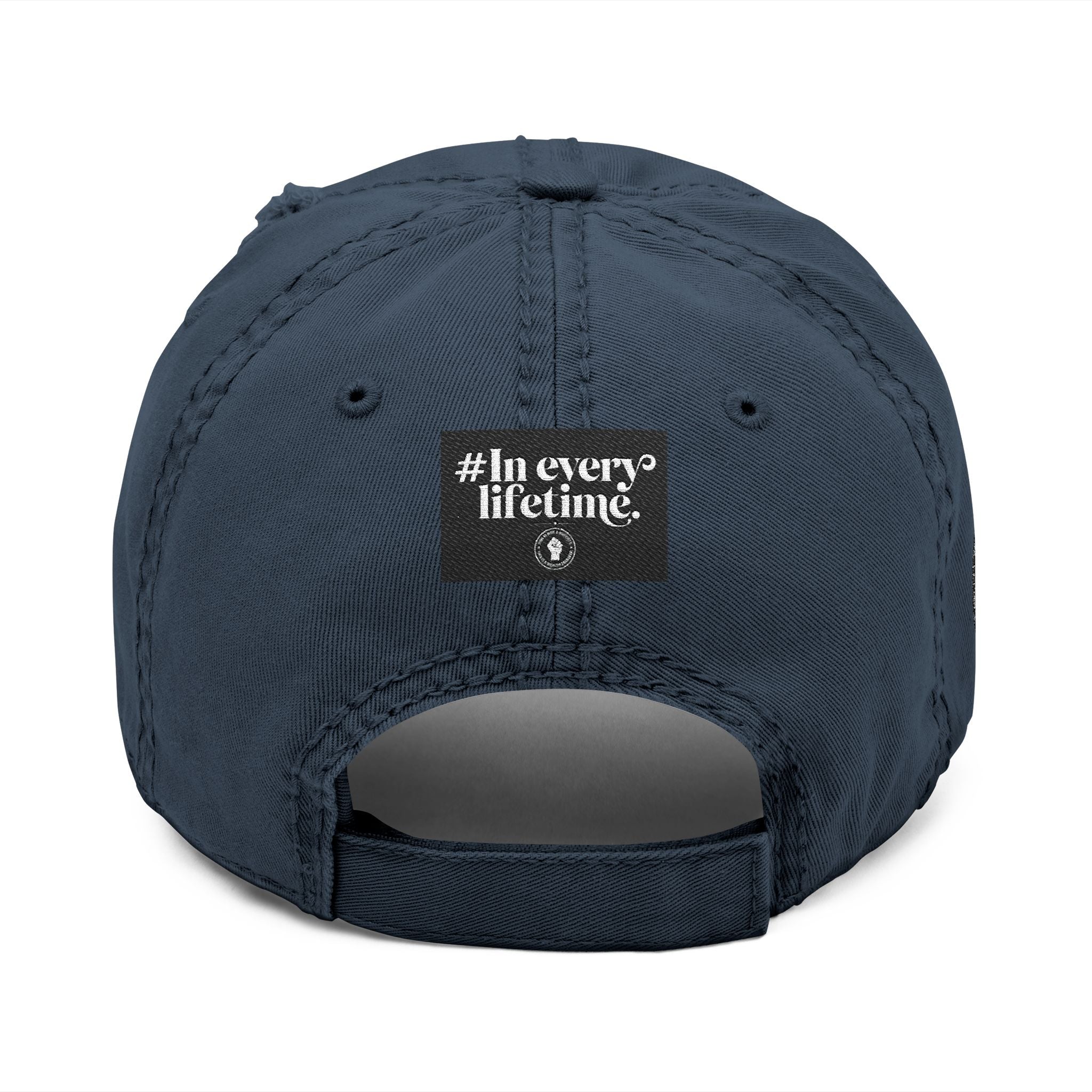 Distressed Embroidered Dad Hat — Raised Fist Emblem, “In Every Lifetime” Back Tag