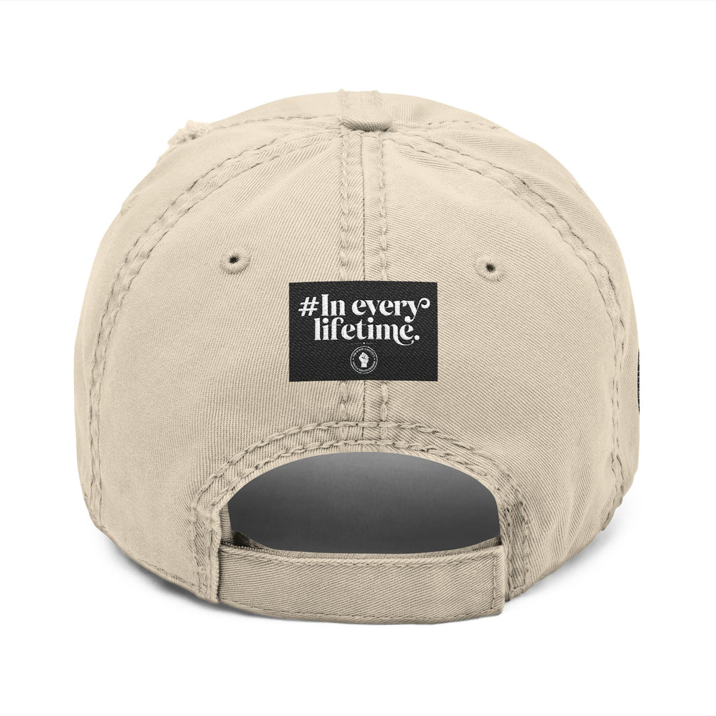 Distressed Embroidered Dad Hat — Raised Fist Emblem, “In Every Lifetime” Back Tag