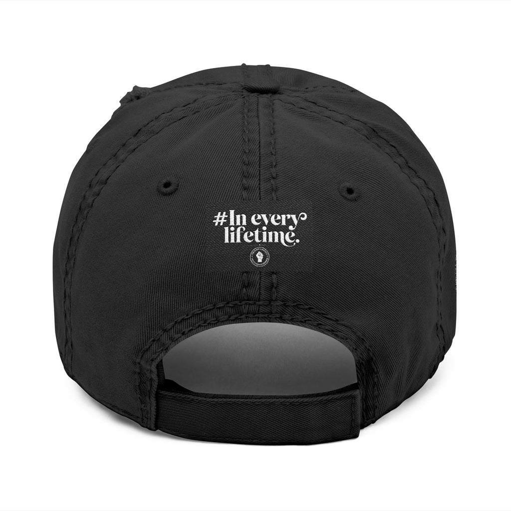 Distressed Embroidered Dad Hat — Raised Fist Emblem, “In Every Lifetime” Back Tag