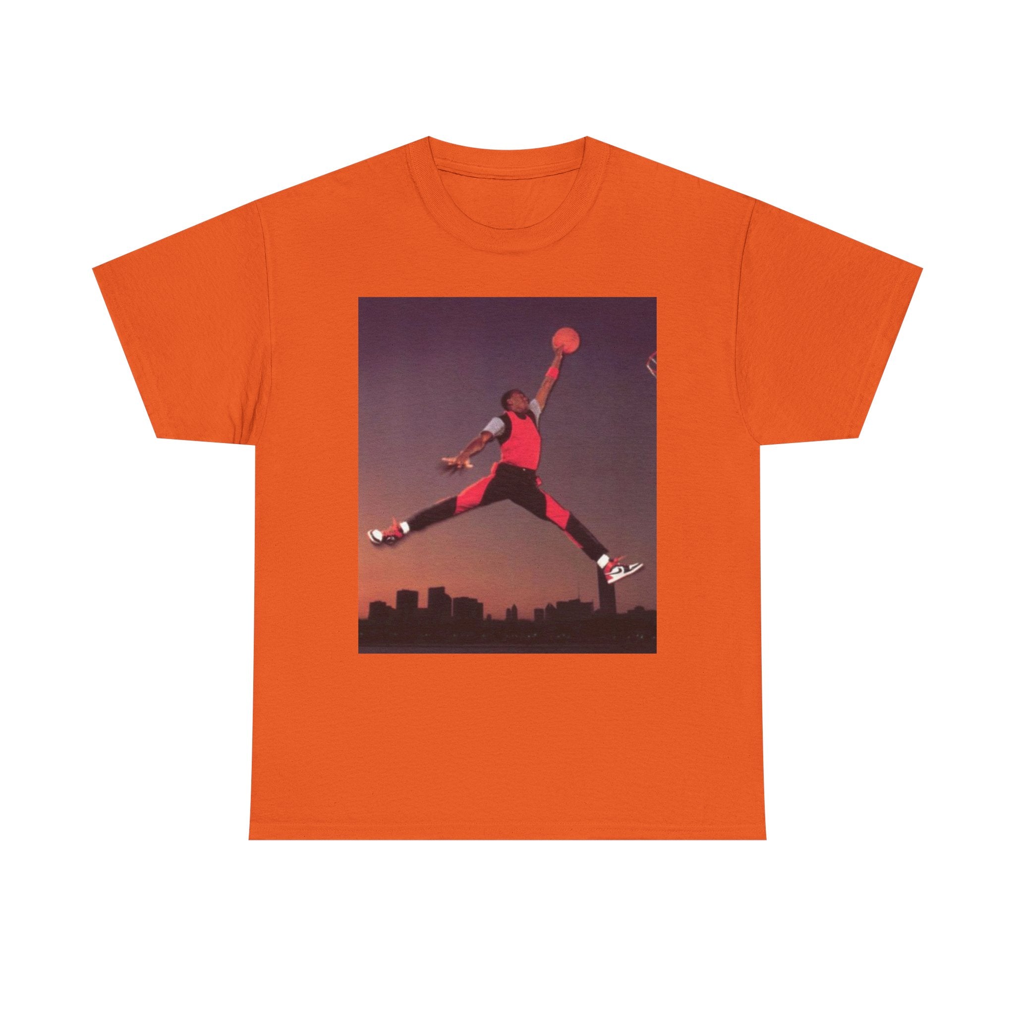 Basketball Jumpman Tee — Retro Skyline Graphic T-Shirt with Red Fist Back Emblem