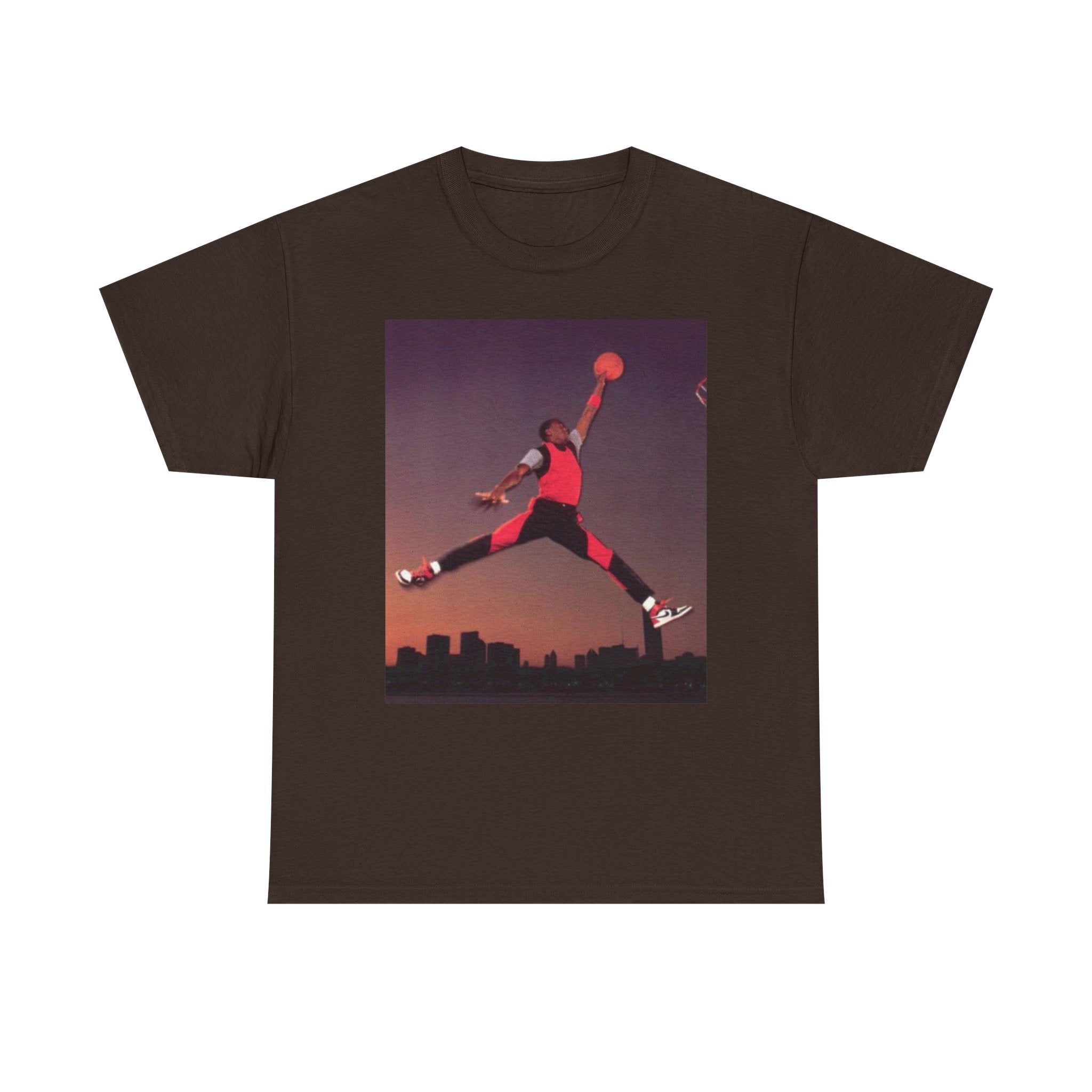 Basketball Jumpman Tee — Retro Skyline Graphic T-Shirt with Red Fist Back Emblem